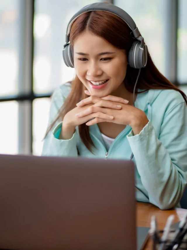 Student on laptop learning online